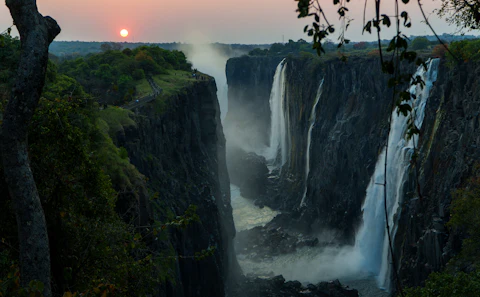 Victoria Falls and its surrounding natural landscape in Zimbabwe.